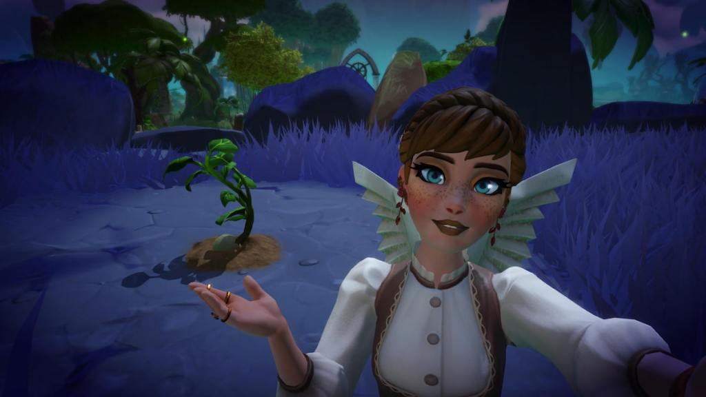 Um jogador estendendo a mão sob uma planta de batata no Disney Dreamlight Valley