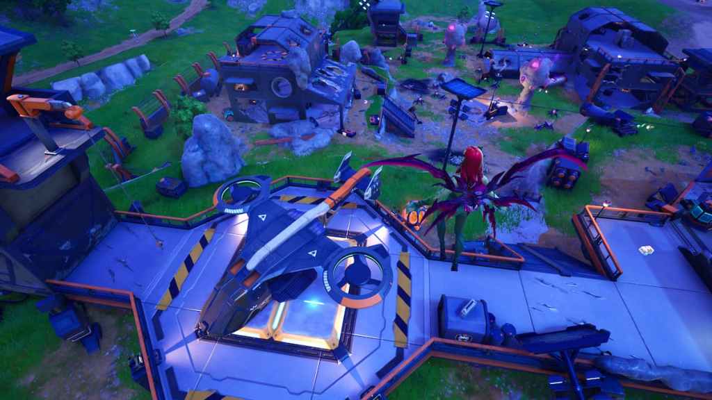 Voando sobre um hammerhead Choppa em uma plataforma de pouso em Fortnite