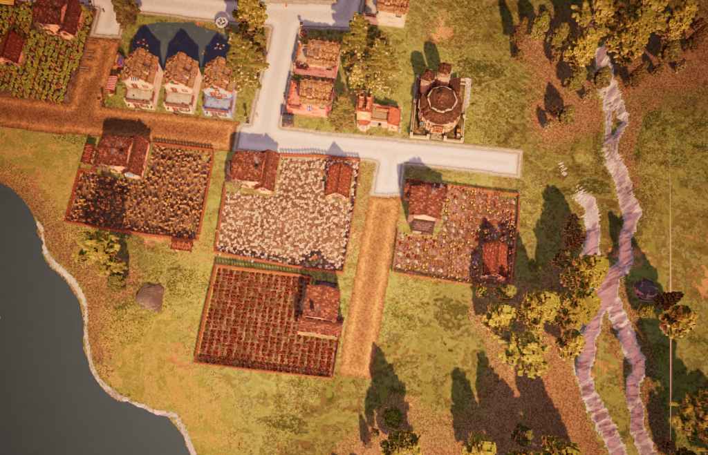 Várias fazendas estão em um campo e estão cercadas por cercas irregulares.