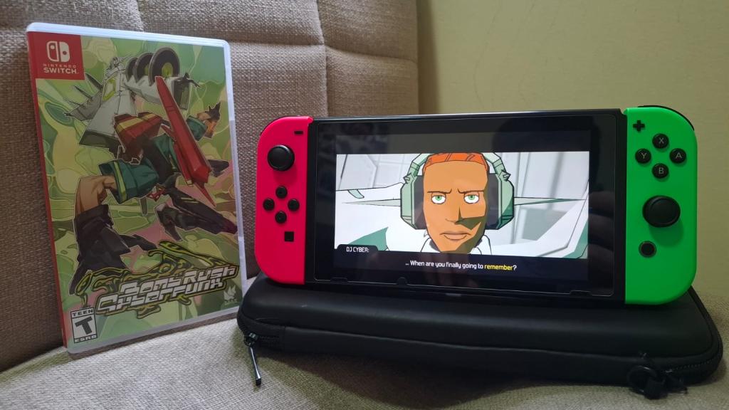 Uma foto da Bomb Rush Cyberfunk Box ao lado de um Nintendo Switch executando o jogo.