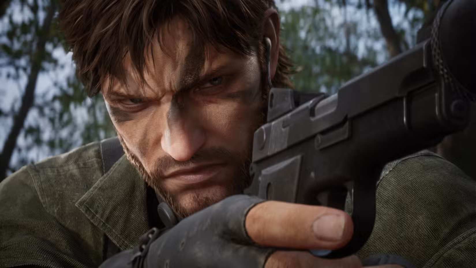 Um close do rosto coberto de tinta camuflada de Naked Snake em Metal Gear Solid Delta