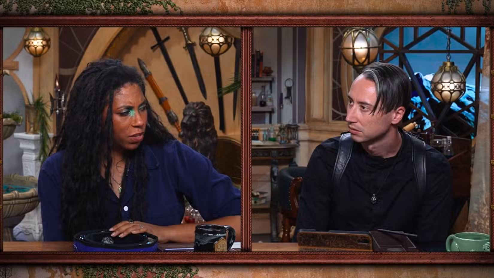 Uma imagem da campanha 4 do episódio 11 de Critical Role. Apresenta Aabria Iyengar e Alexander Ward em um cenário de fantasia.