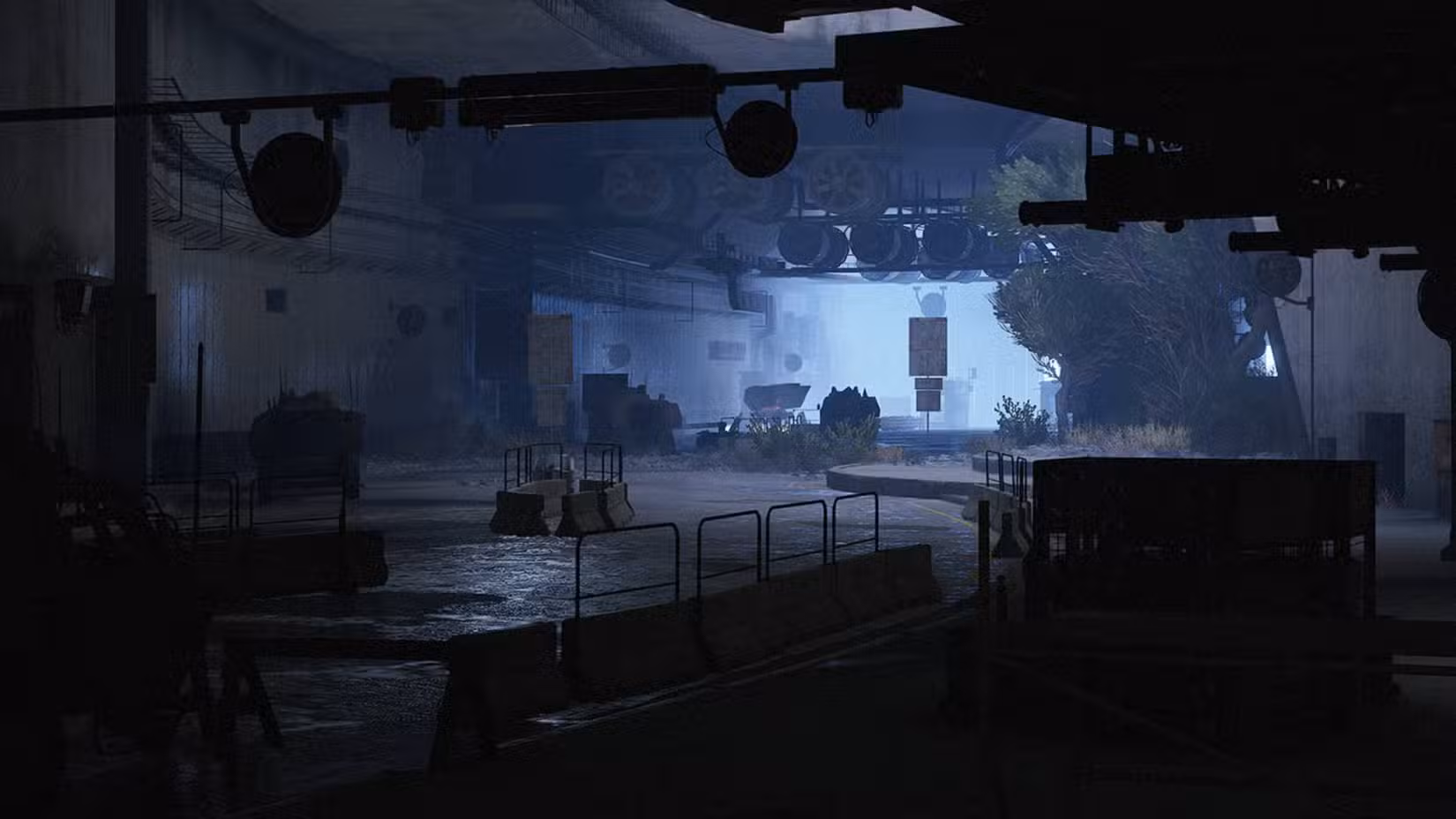 Dentro de um túnel no Blue Gate em Arc Raiders, com veículos abandonados à distância.