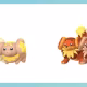 Fidough e Daschbun com suas formas brilhantes em Pokémon Go. Ambos ficam castanhos claros.