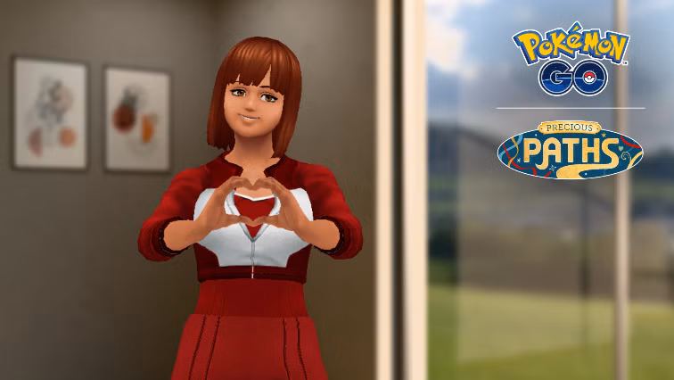 Uma treinadora de Pokémon Go faz um formato de coração com as mãos