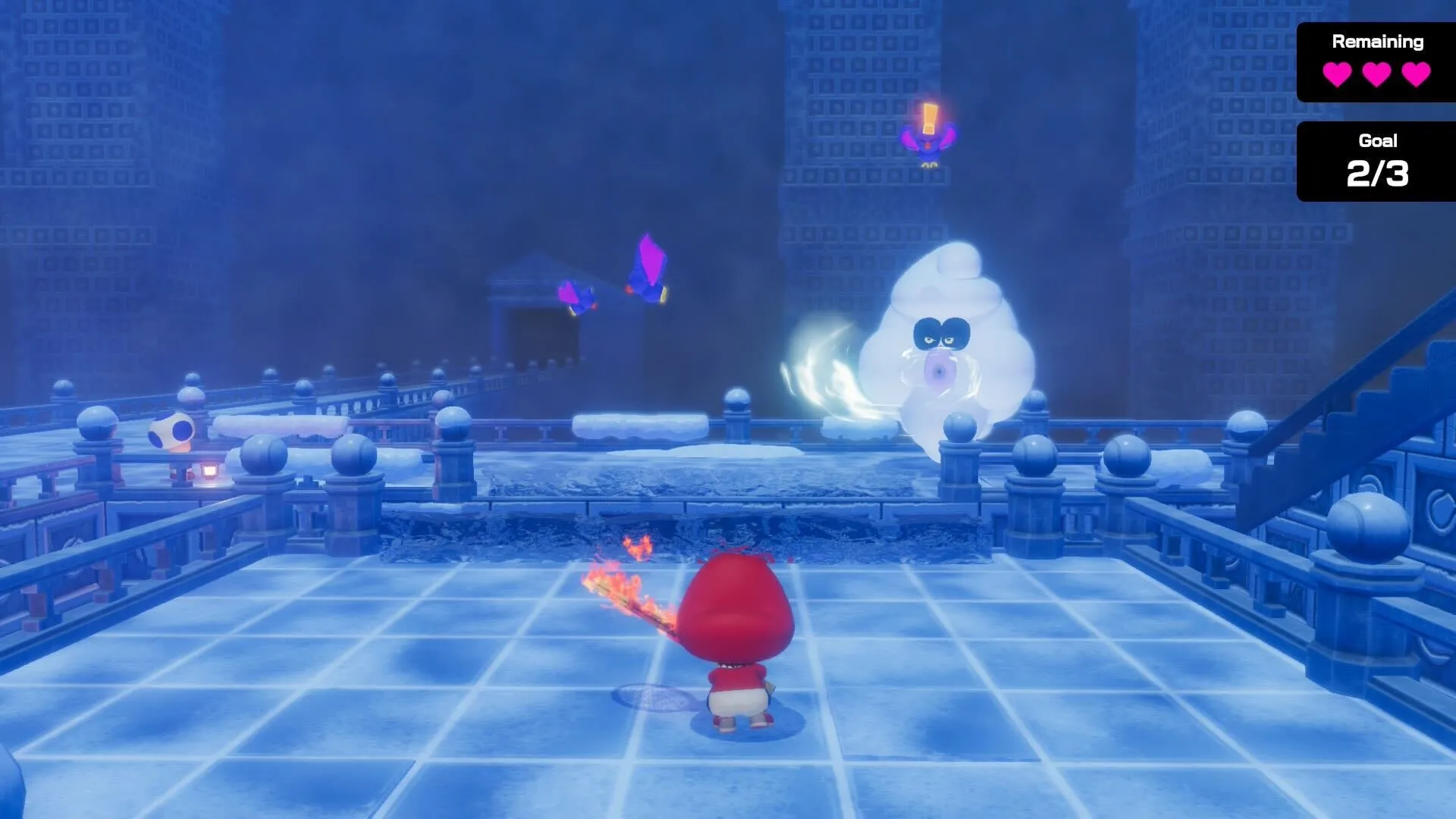 Baby Mario está em um palácio de gelo com um monstro tornado soprando vento contra ele.