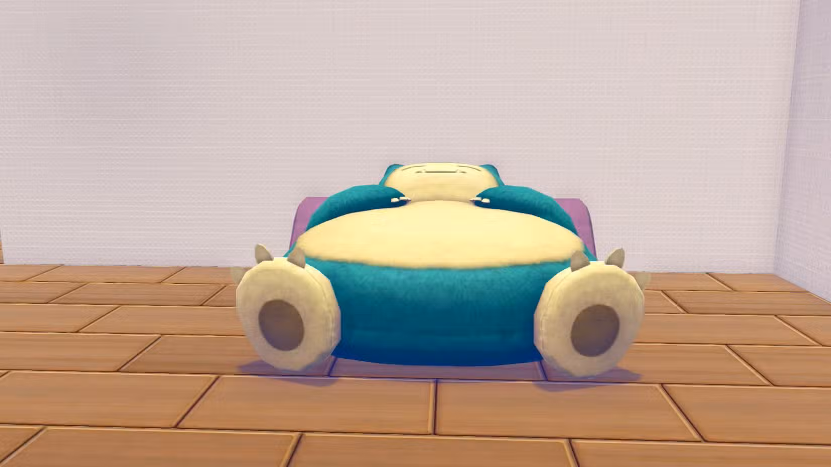 Uma cama que parece um Snorlax relaxando contra uma almofada roxa em Pokopia.