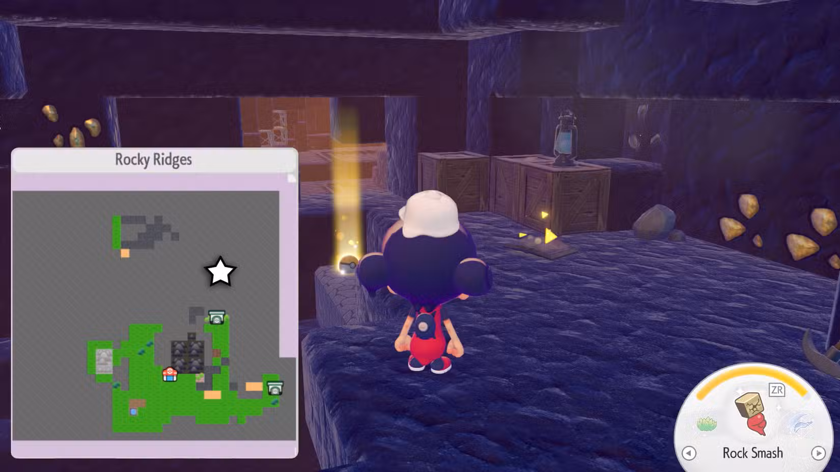 Um Ditto se aproxima de um livro brilhante no chão das minas em Pokopia