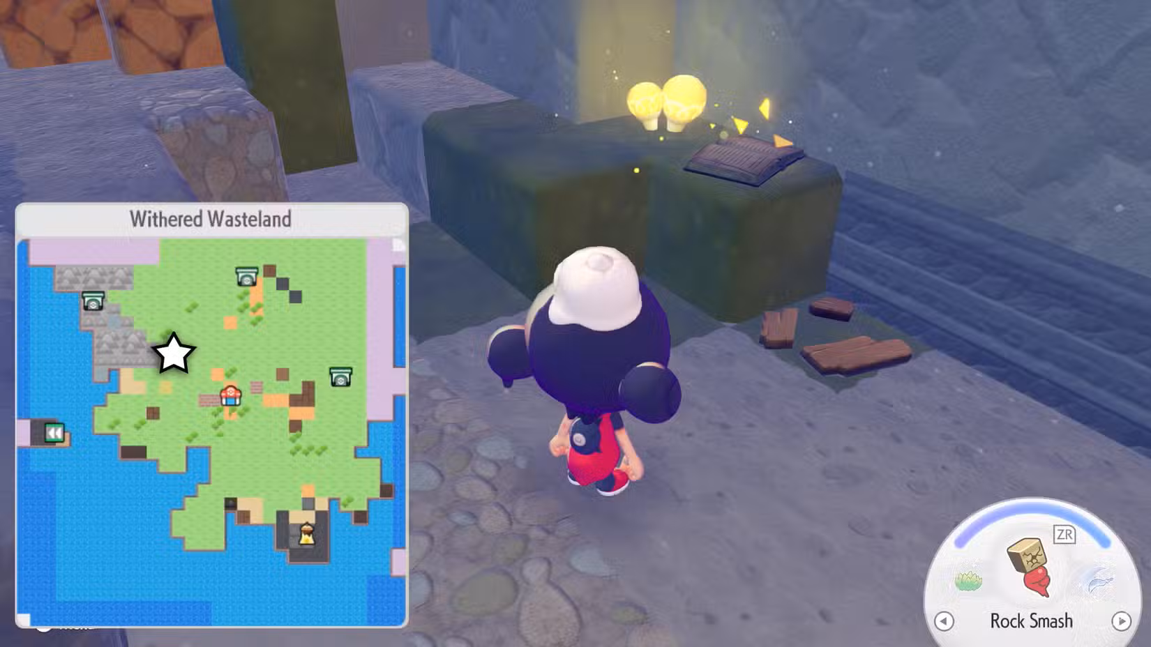 Um livro brilhando dentro de uma caverna em Pokopia.