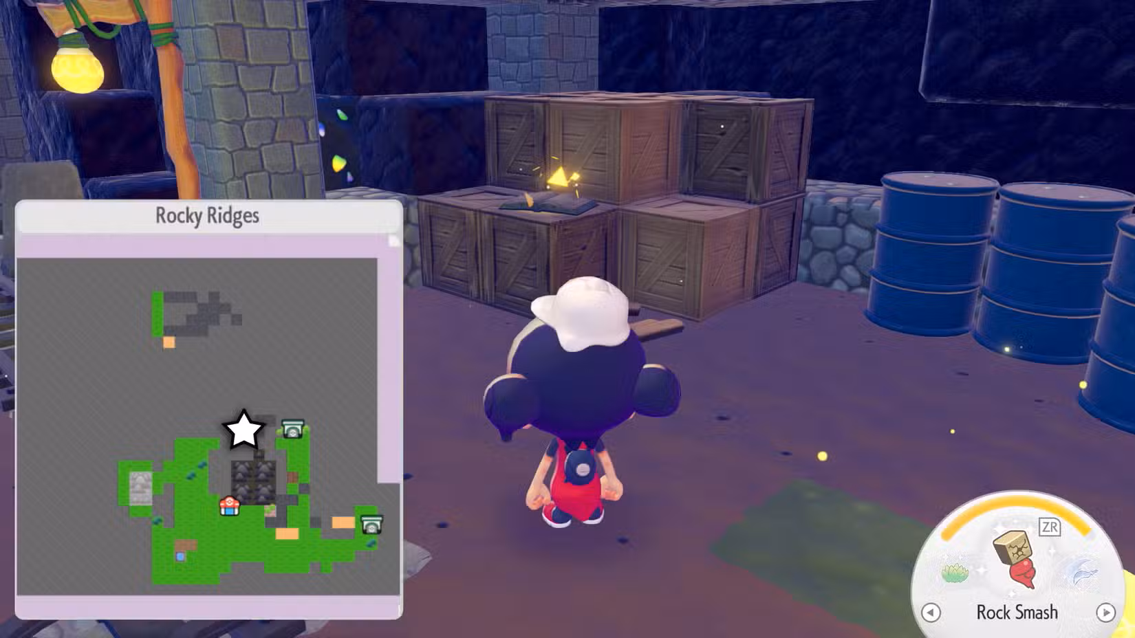 Um livro em cima de um monte de caixotes em Pokopia.