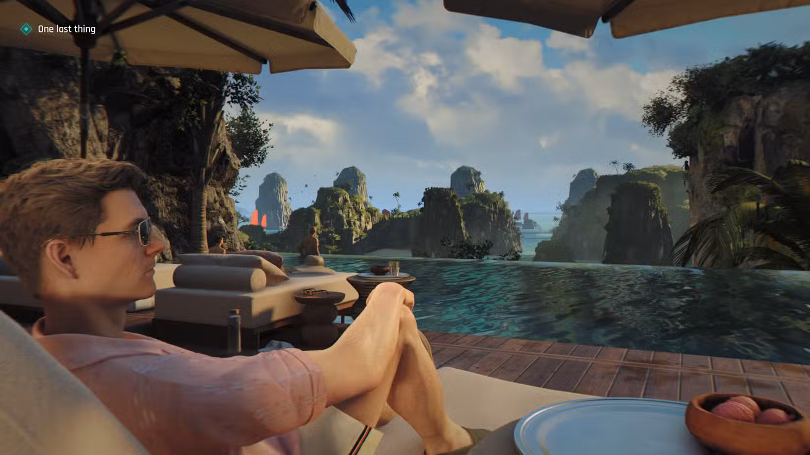 James Bond lounges in a chaise by a pool in 007 First Light