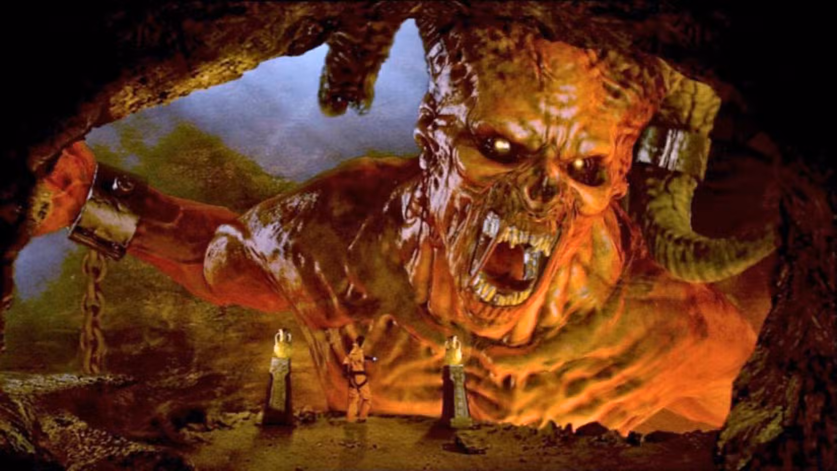 Doctor Who image of a giant, horned creature trying to lash out, but he is chained up.