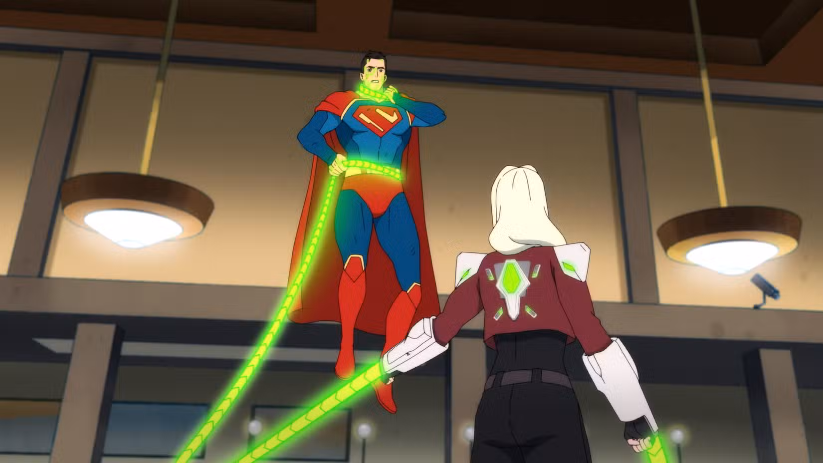 Superman is held by a bank robber