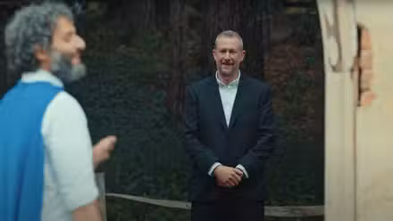 Alex Horne and Jason Mantzoukas laughing on the set of Taskmaster