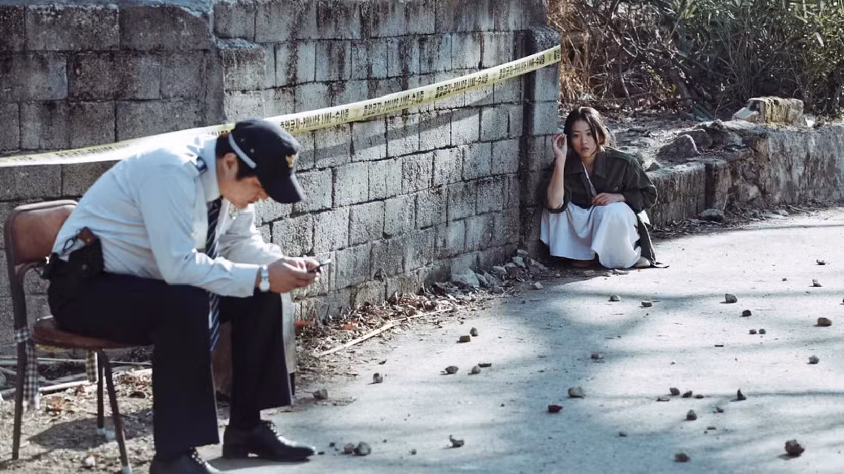 2.-The-Wailing-woman-throwing-rocks-at-Jong-Goo